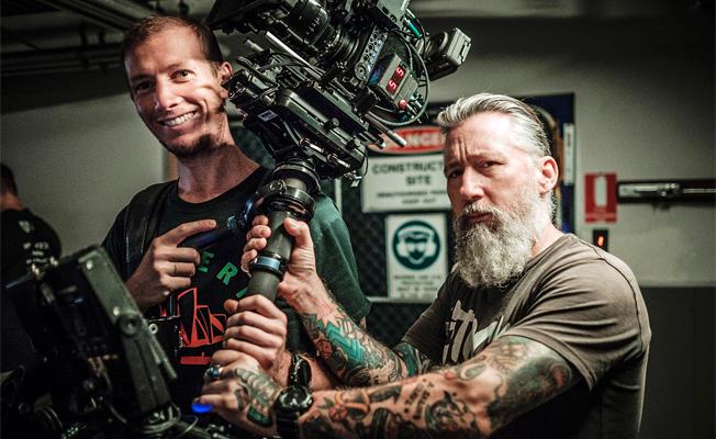 HONORABLE MENTION WINTER 2017/18: John Platt, our Grand Prize winner, gets a second prize, a first in the contest’s short history, with this shot of camera operator Jonno Tyler and dolly grip Troy Pachini on the set of "Nekromancer," Fox Studios, Sydney Australia. Photo credit: John Platt