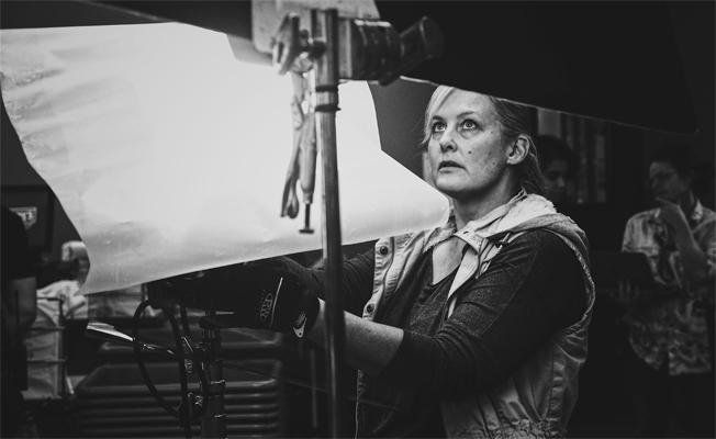 HONORABLE MENTION WINTER 2017/18: Key grip Terri Birnbaun on set of film short "Restock" directed by Shelby Dillon. According to Tinker, the majority of the crew members were women. Photo credit: Tinker Yan