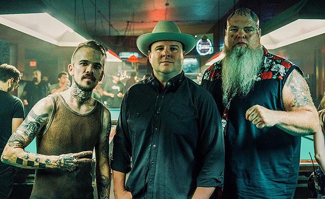 Director Justin Corsbie (at center, with actors Zac Badasci and Randall Reeder) places much of the narrative in “Hard Luck Love Song” around the world of songwriters, singers and honky-tonks.