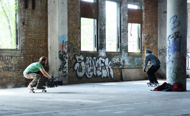 The SUMMER 2016 Contest WINNER image above, using a Canon EOS 5D, catches cinematographer Steven Holleran shooting a skate sequence with Kirby Metzger, from his Sector 9 board holding a Red Dragon with Master Anamorphic lens, for IFC Films' "The Land." Photo credit: Timothy D. Kanieski